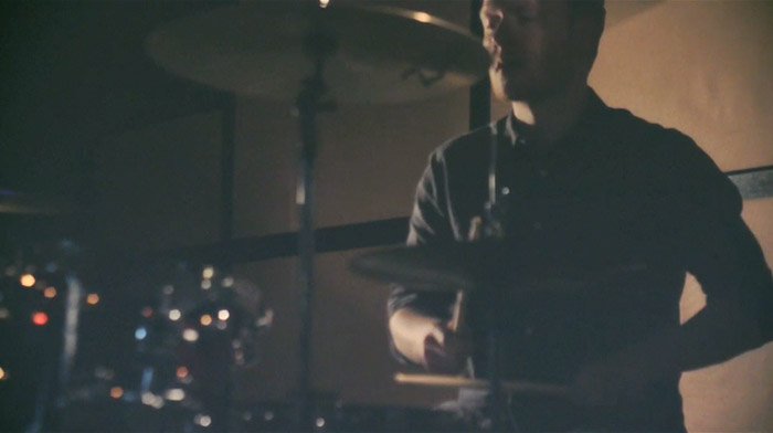 Alex Esp playing in The Yacht Club's Greatest Misadventure music video